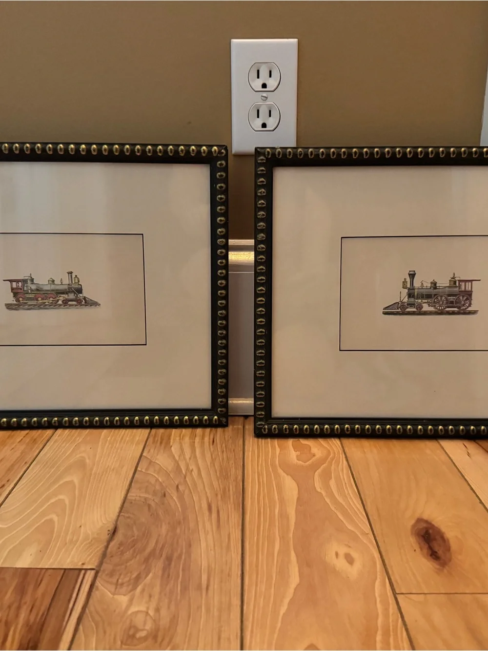 Locomotive matted print in black decorative frame with brass stud look accents